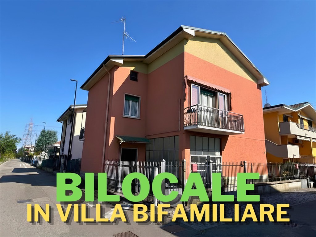 Bilocale indipendente con giardino e box in villa bifamiliare